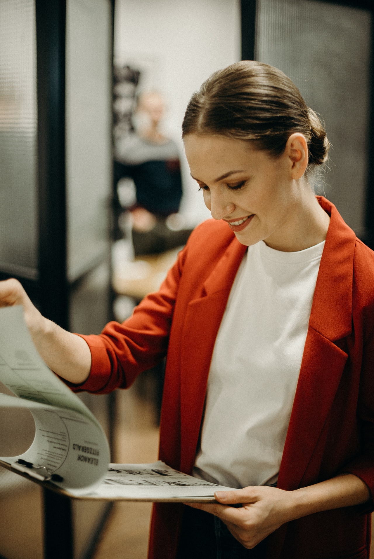 A woman checking a list
